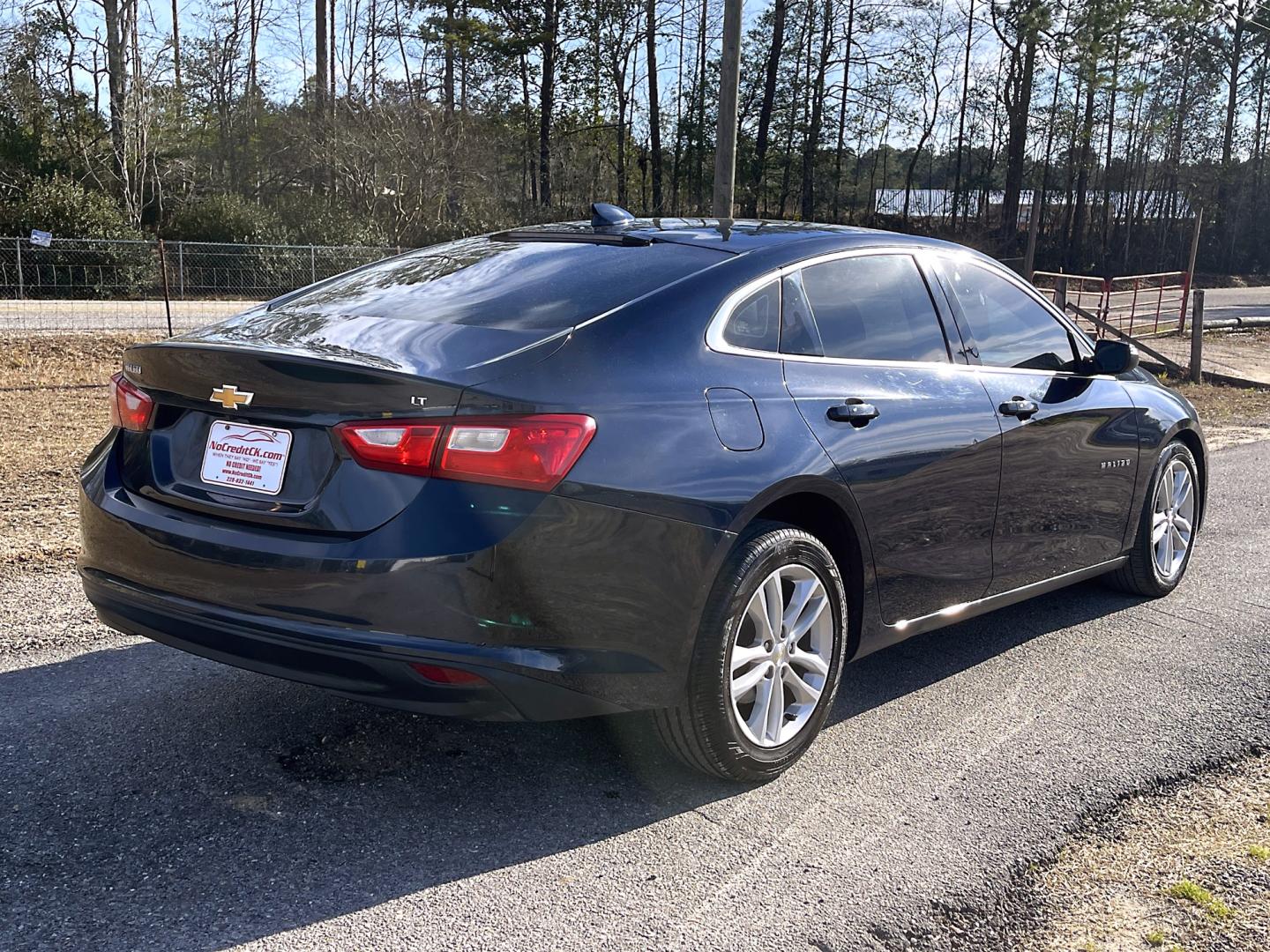 2018 Blue Chevrolet Malibu LT (1G1ZD5ST0JF) with an 1.5L L4 DOHC 16V engine, 6 Automatic transmission, located at 18001 Kellogg Rd, Saucier, MS, 39574, (228) 832-1441, 139.421463, -76.641457 - Photo#5